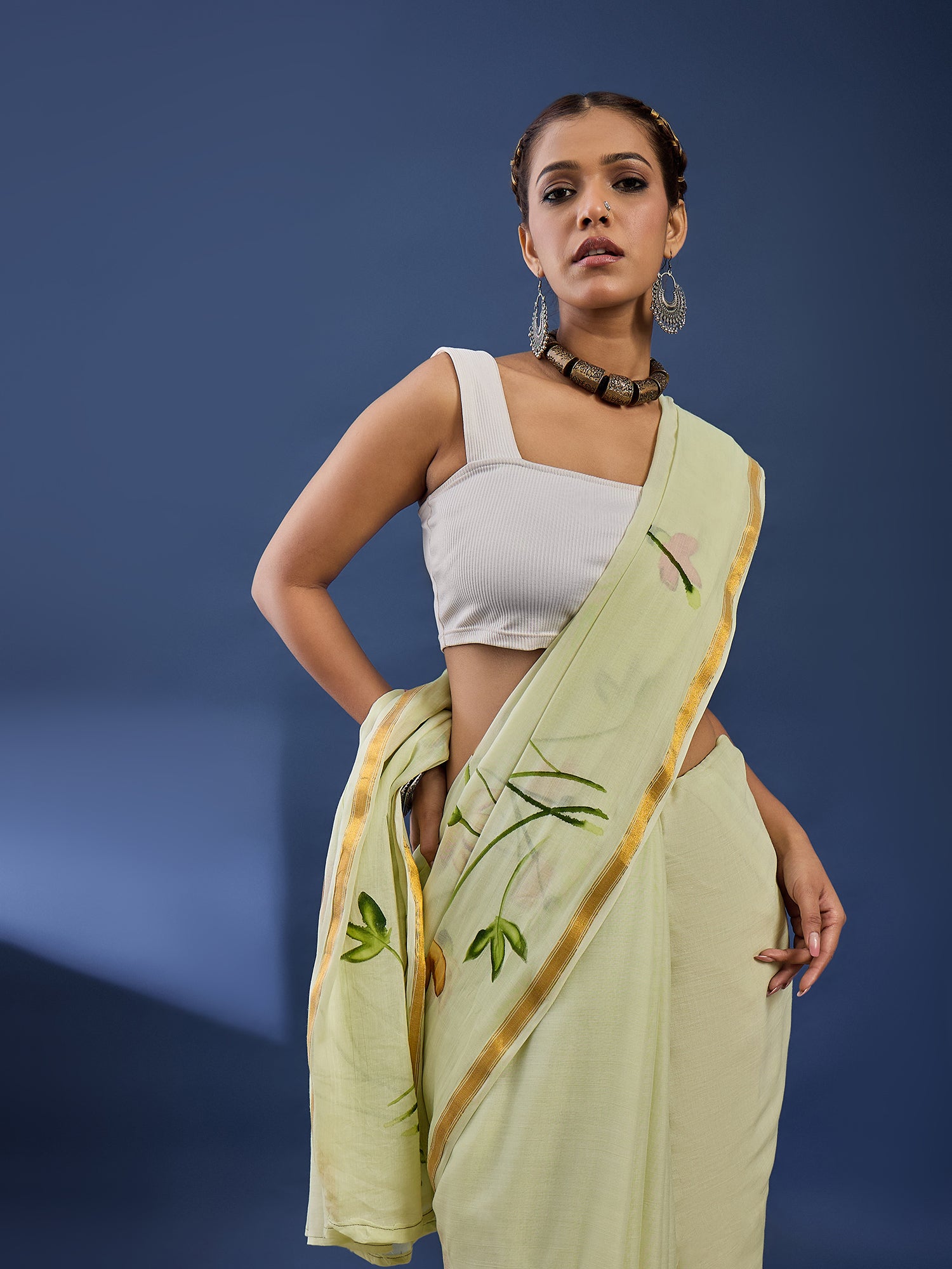 Elegant Light Pistachio Hand-Painted Floral Saree with Golden Border