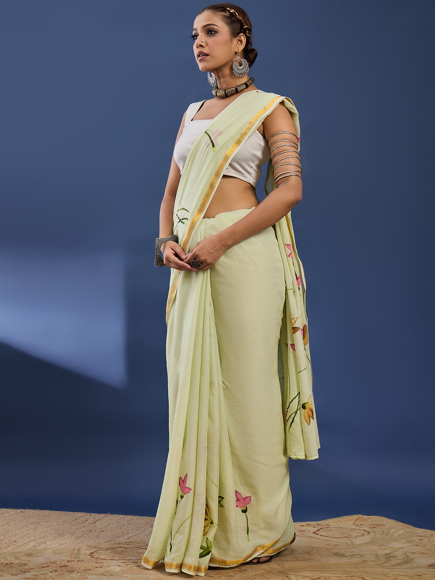 Elegant Light Pistachio Hand-Painted Floral Saree with Golden Border