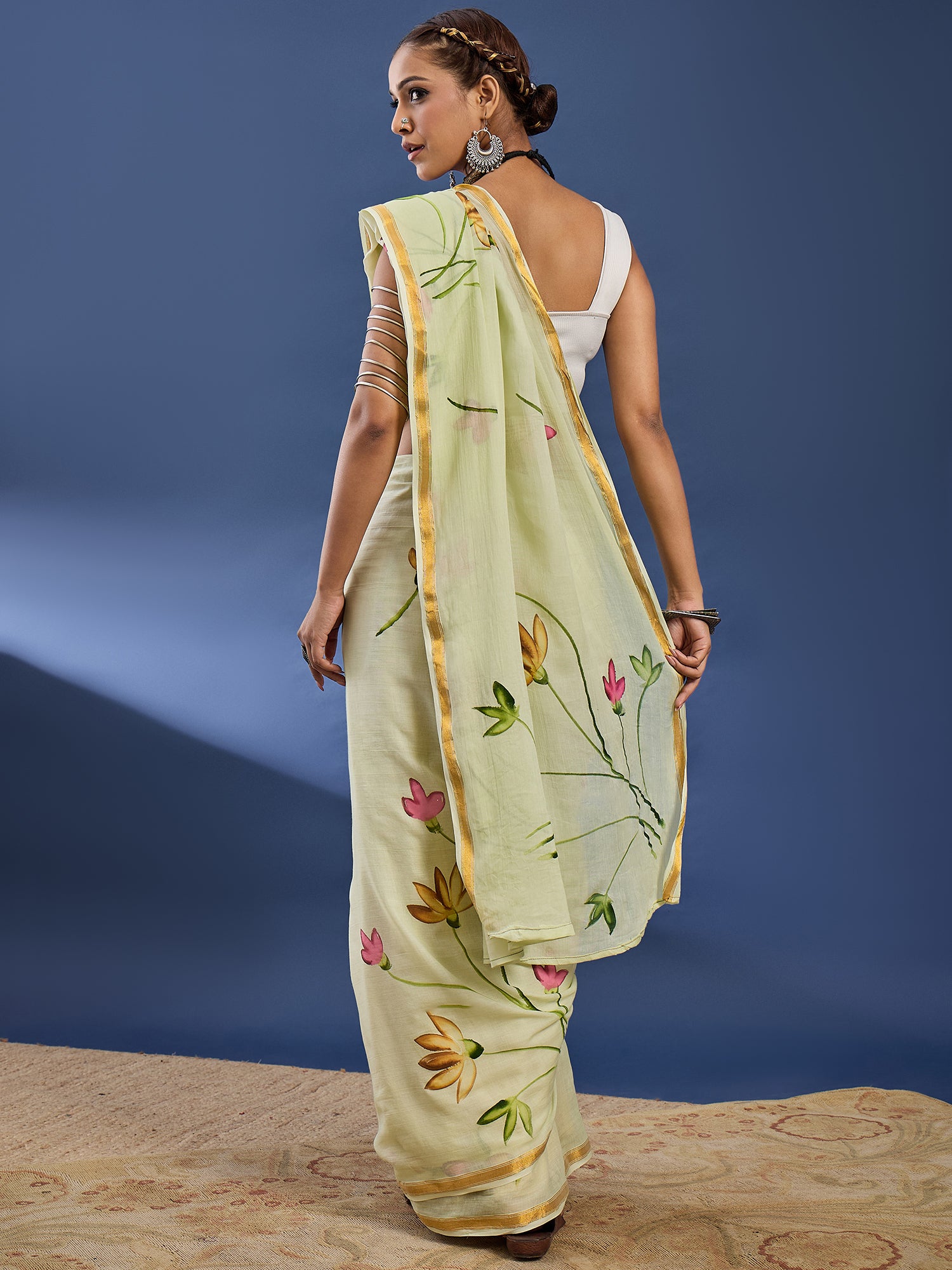 Elegant Light Pistachio Hand-Painted Floral Saree with Golden Border