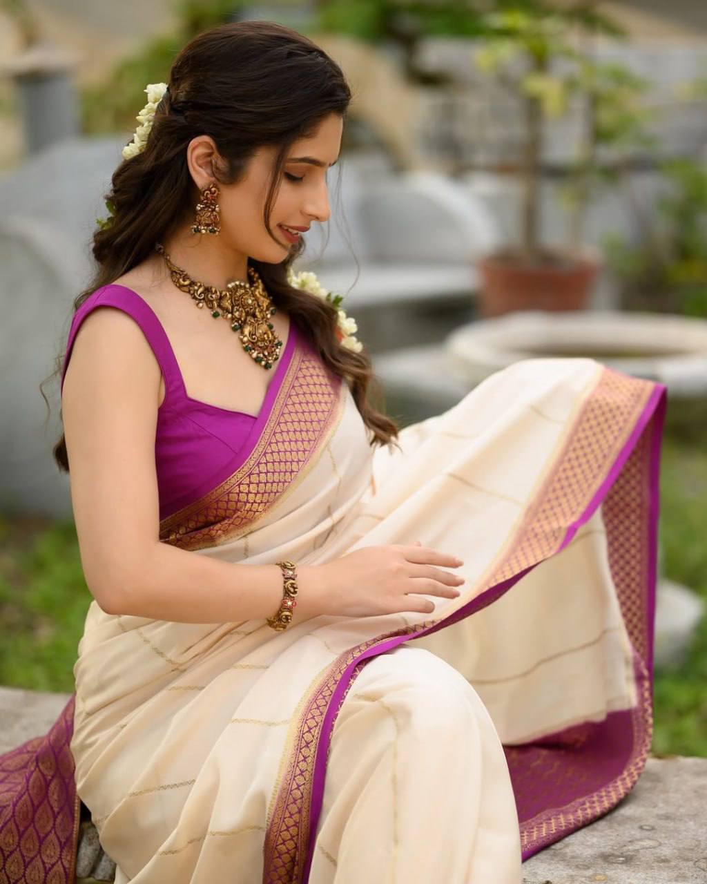 Regal Elegance in Cream & Purple Saree