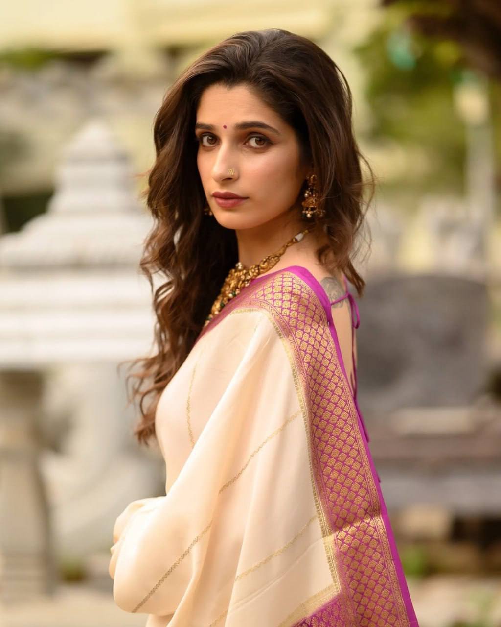 Regal Elegance in Cream & Purple Saree